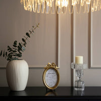 Gold Polyresin Oval Coquette with Bow, 4x6 in.